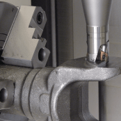 A Fullcut Mill with Contact Grip machining a workpiece.